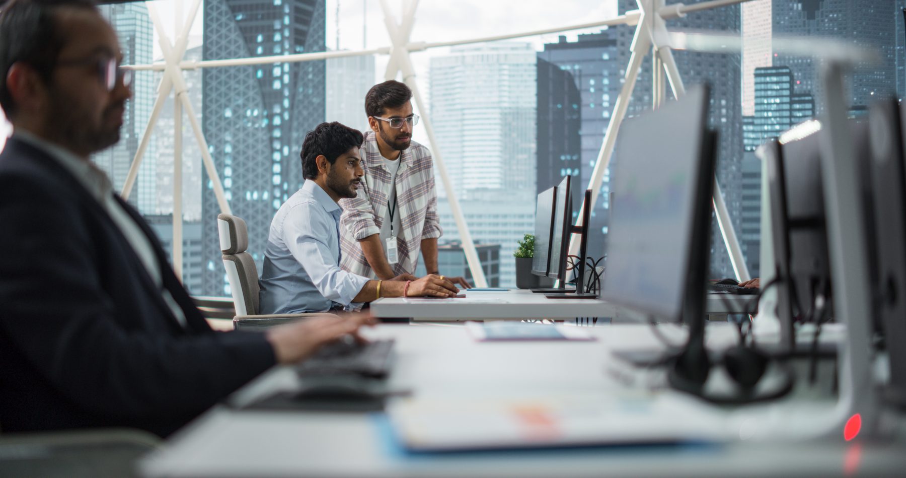 Software engineer and project manager working together